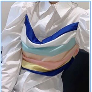 White button down with multi colored design in front